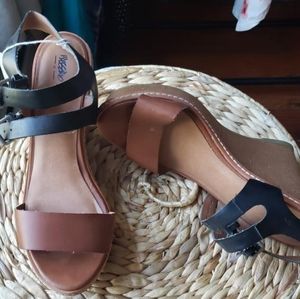 Brown and black faux leather wedges